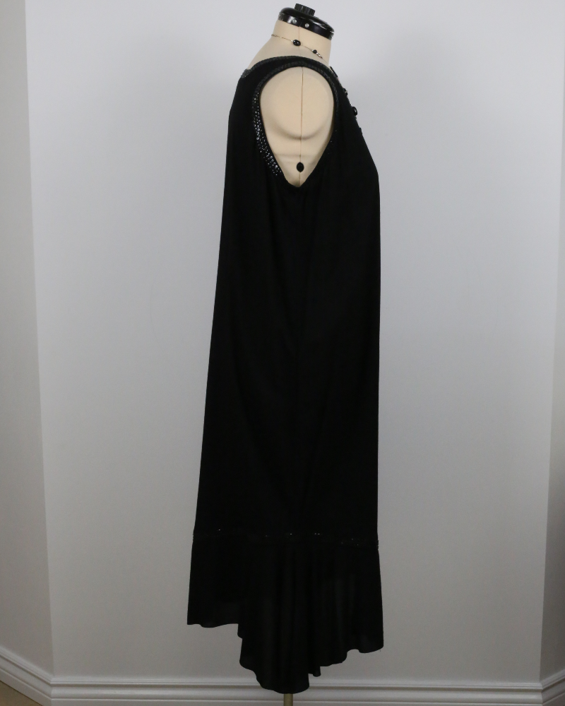 Black dress adorned with shimmering sequins - Angel Circle
